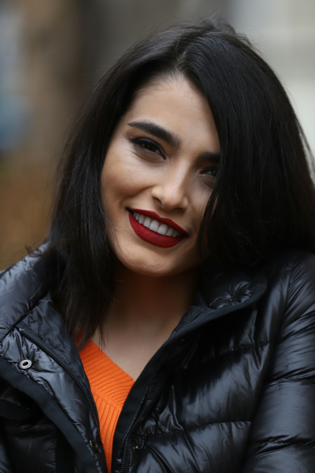 Turkish woman journalist smiling headshot